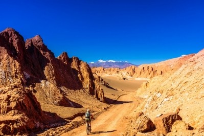 Cyclist in Death Valley by San Pedor de Atacama, Chile. Photo: Getty Images / StreetFlash